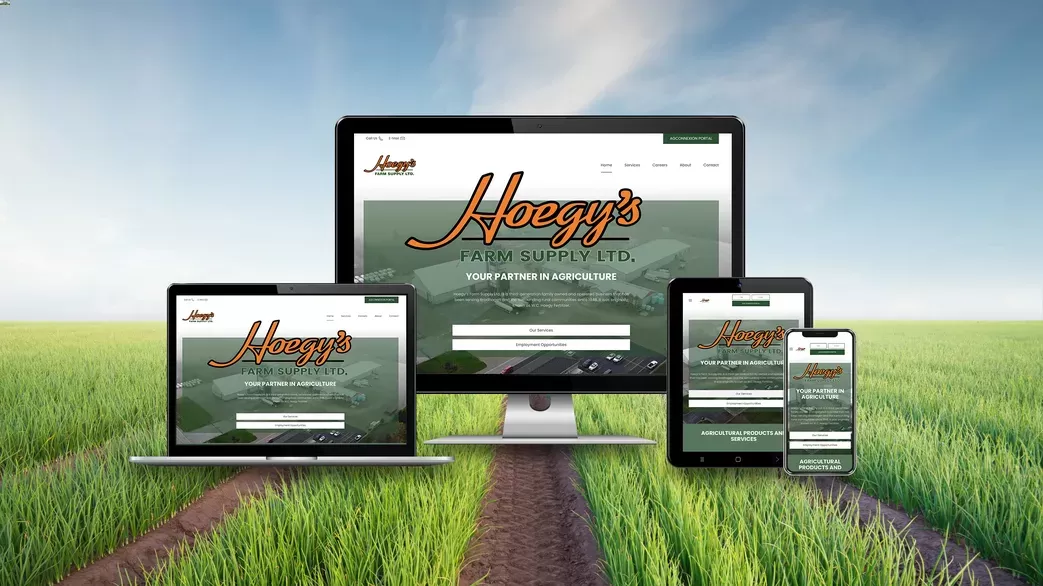 Hoegys Farm Supply website responsive views with farmland in the background green grass and blue skies