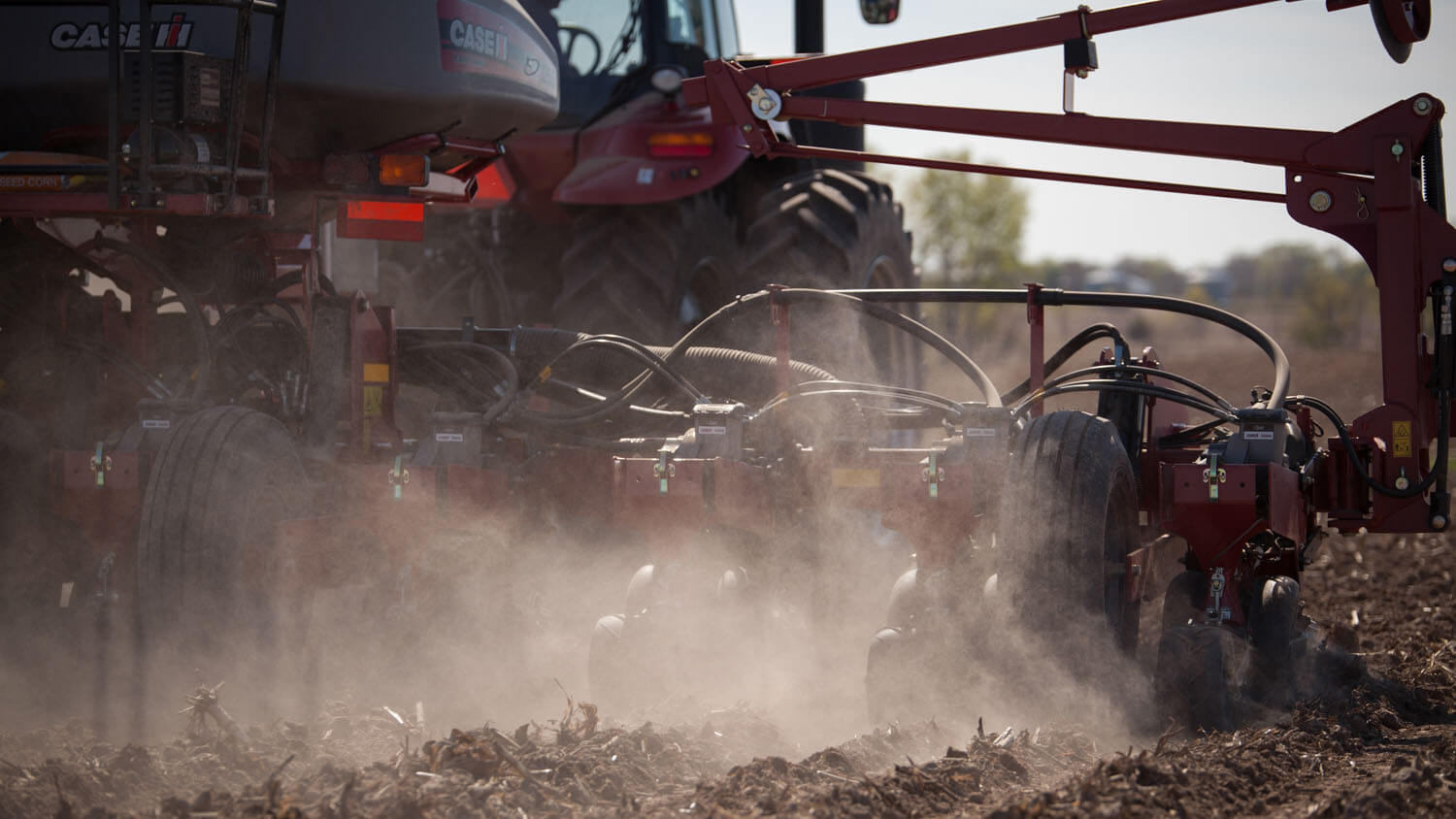 Specialized farm equipment working on soil